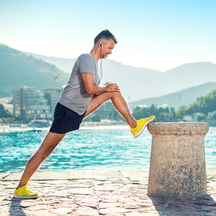 Man stretching before jogging