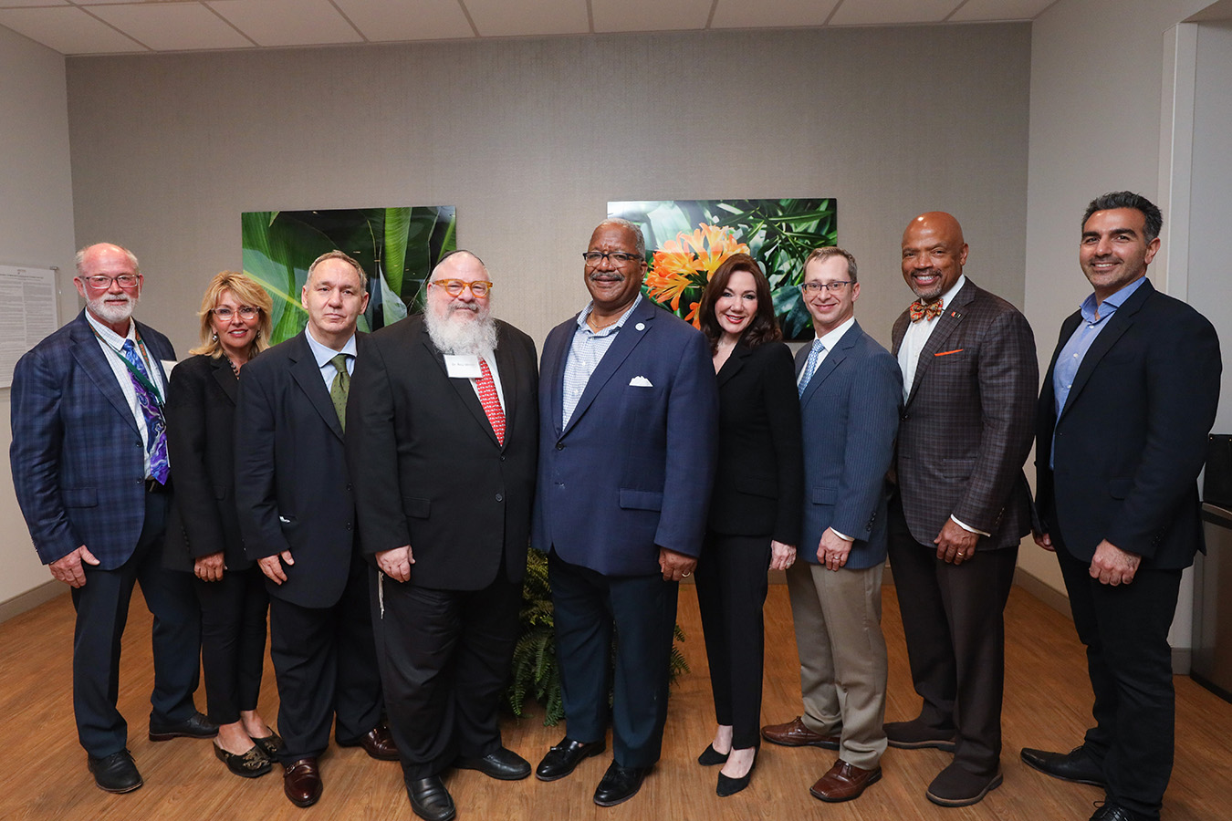 Dean Ford and team members at UHealth West Palm opening