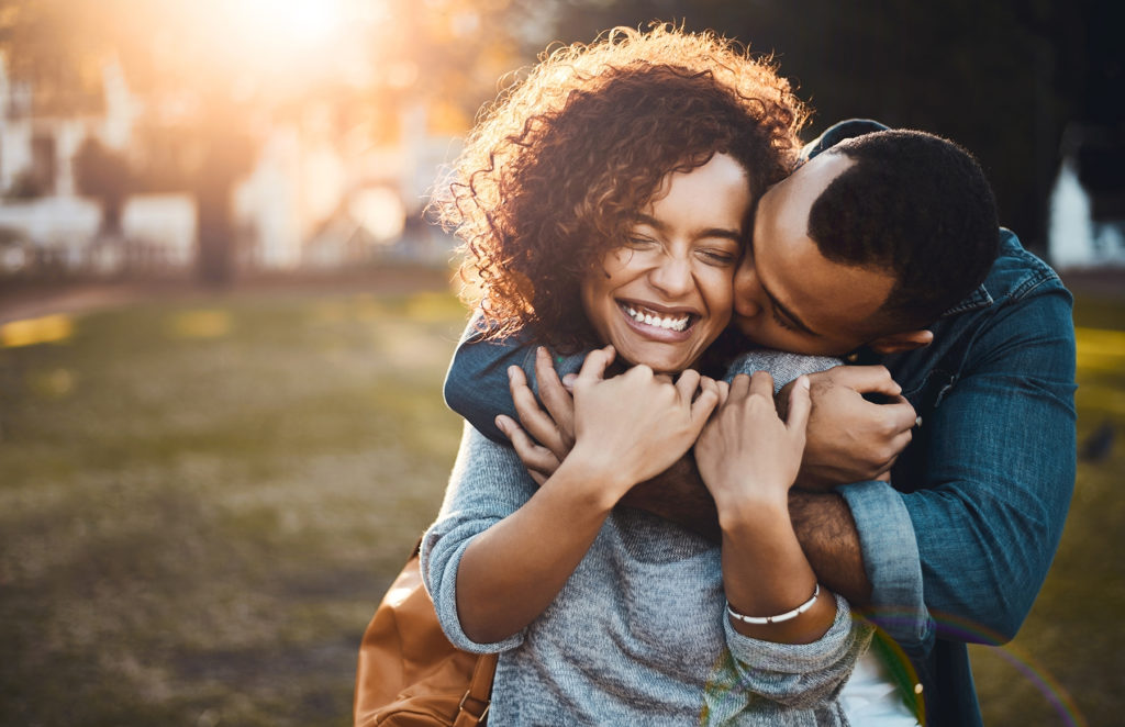 Affectionate young couple in the park