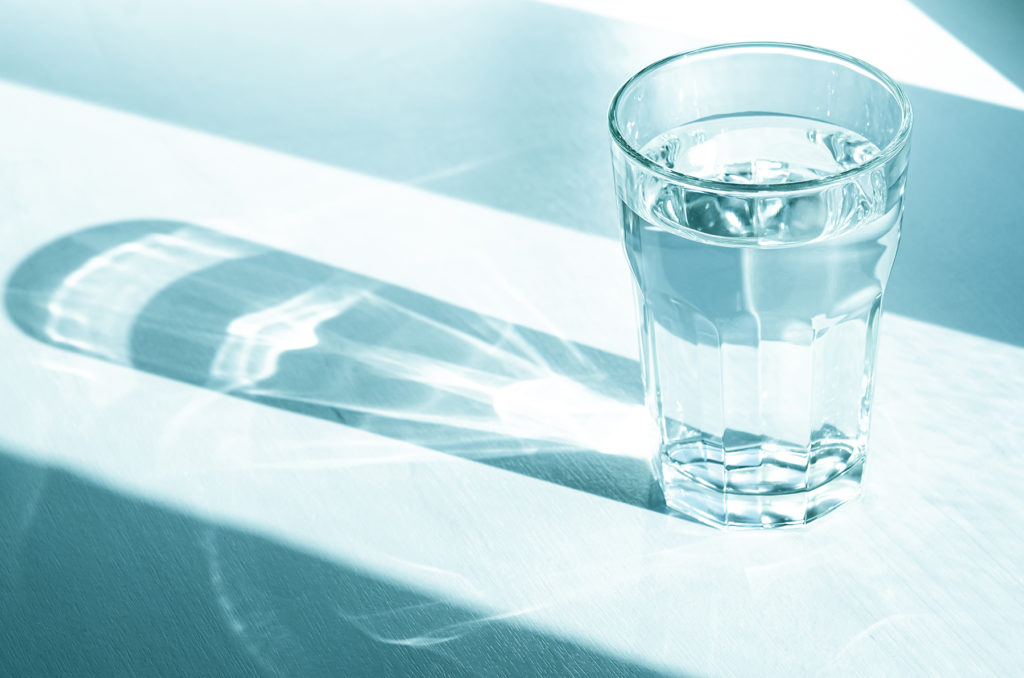 Glass of water on a table