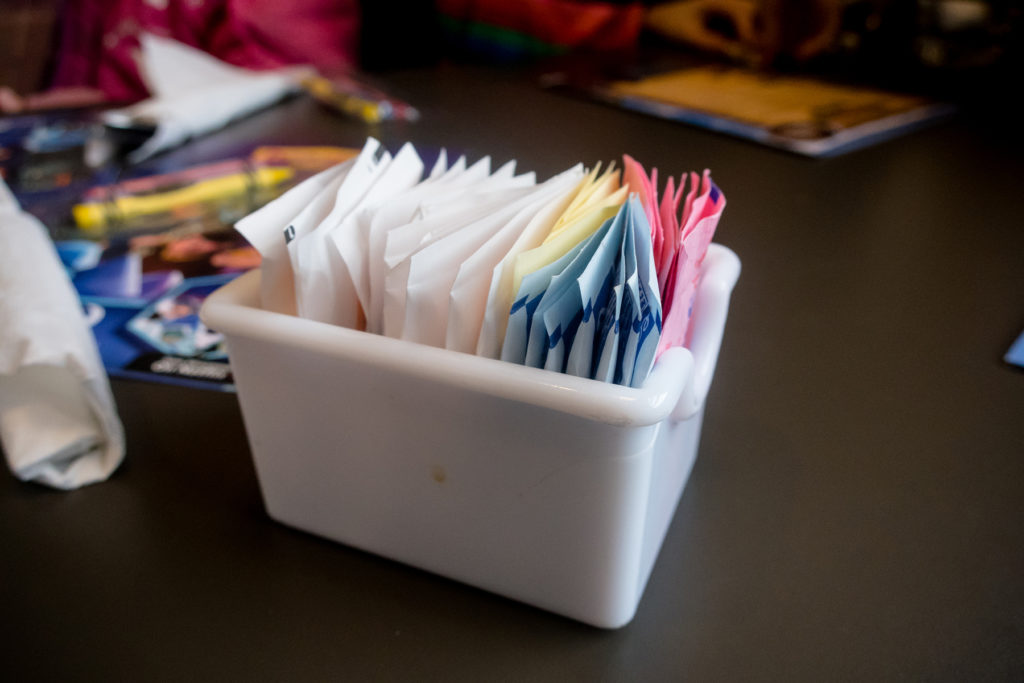 sugar packets on table