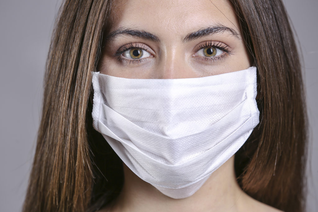 Girl in respiratory mask