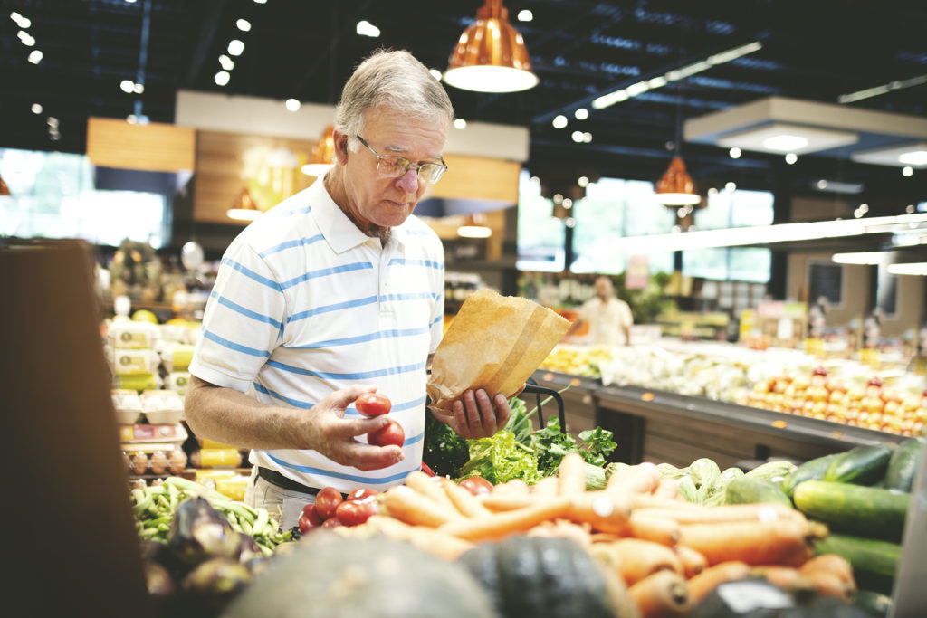Older man food shopping