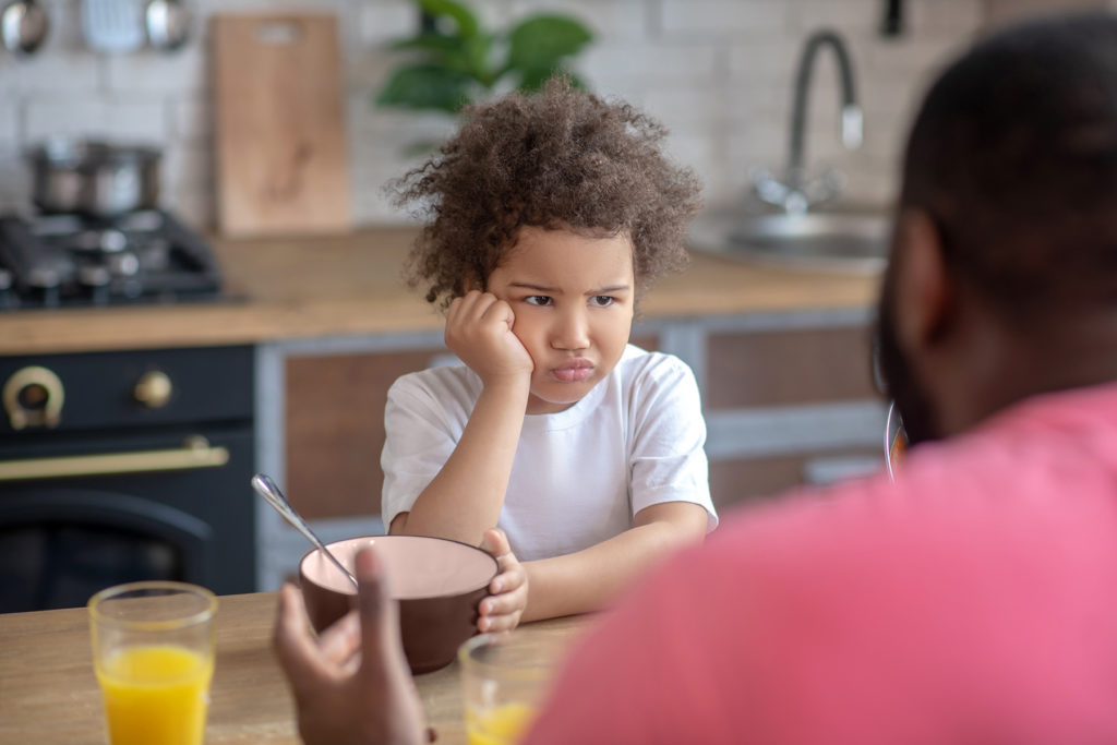 Cute kid who doesn't want to eat