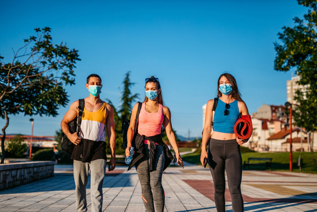 Young people walk to yoga during pandemic