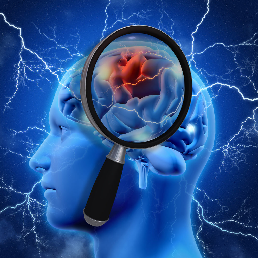 magnifying glass examining brain