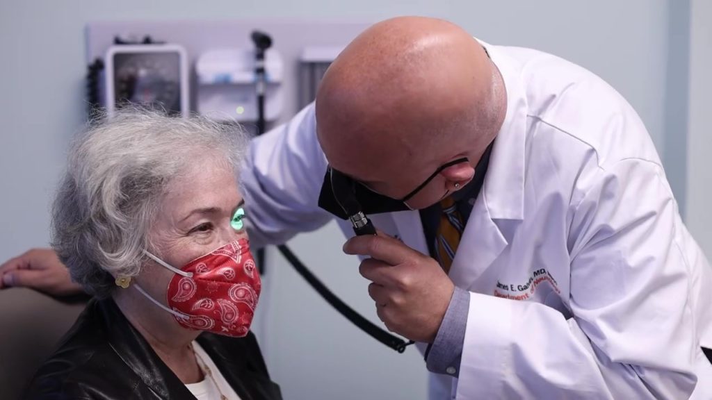 Brain specialist examining patient
