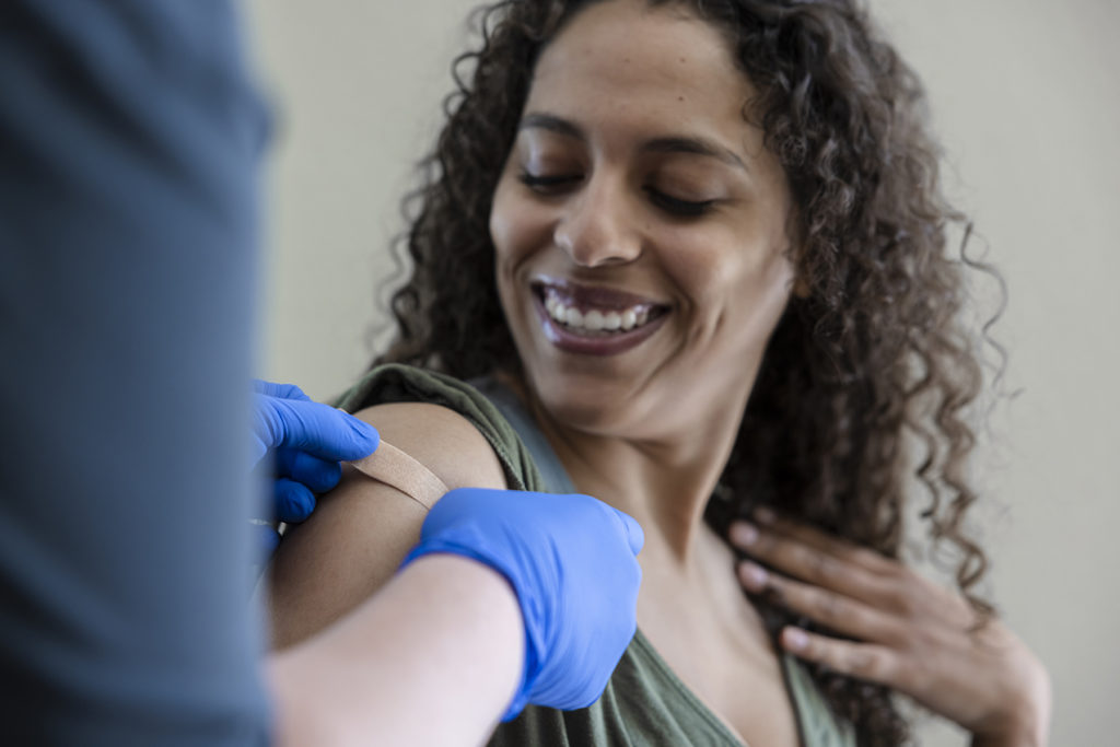 Woman getting vaccinated